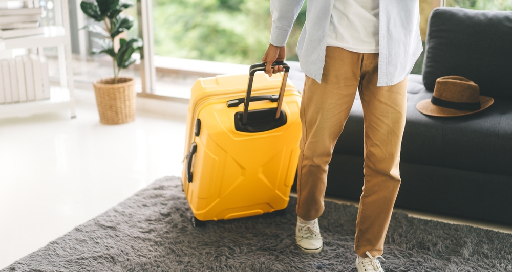 maleta, persona que va de viaje