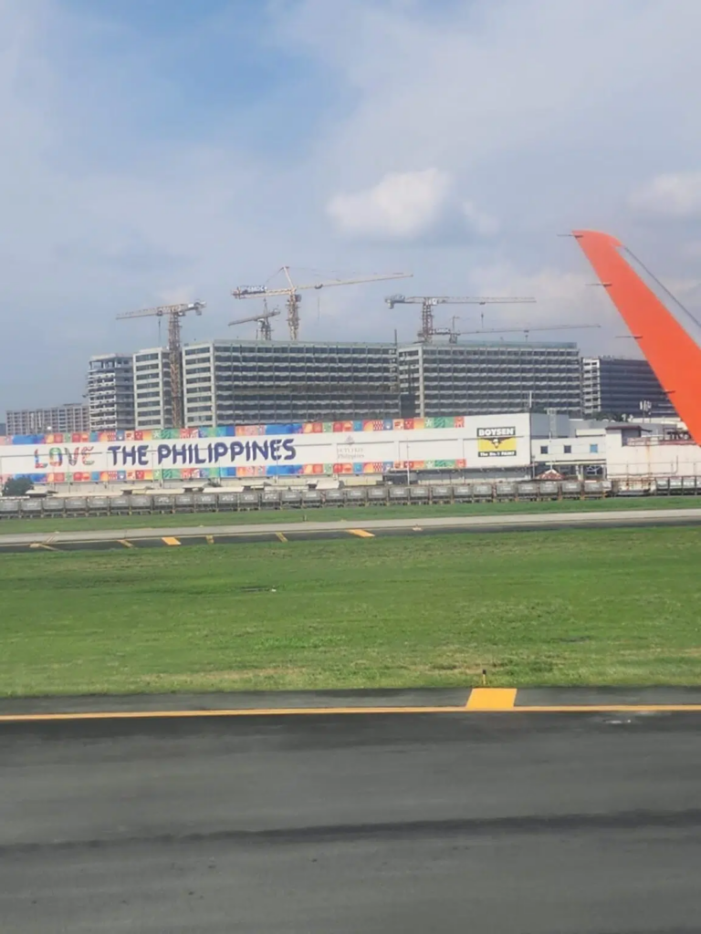 Messaggio di benvenuto all'Aeroporto Internazionale Ninoy Aquino