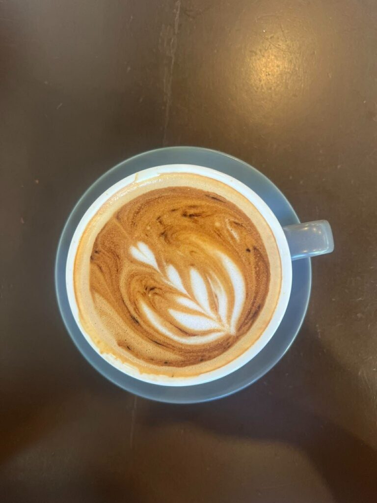 Stopping for a latte, my go-to café order wherever I go.
