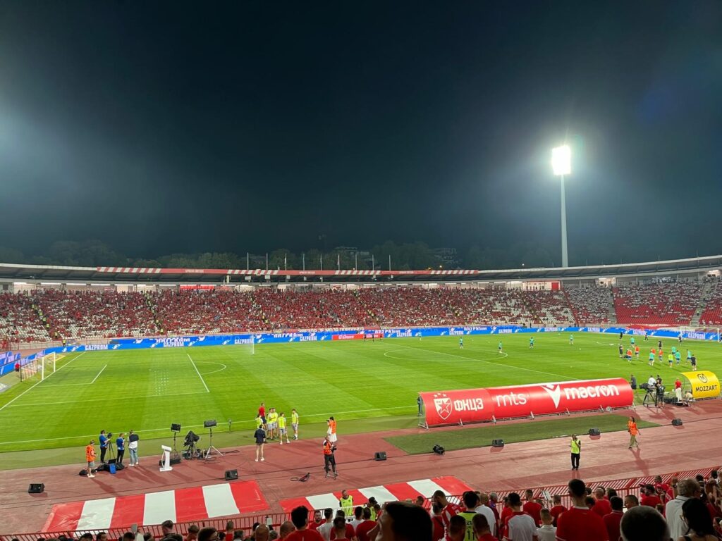 Watching the UEFA Champions League qualification match in Belgrade and uploading pictures using an eSIM. 